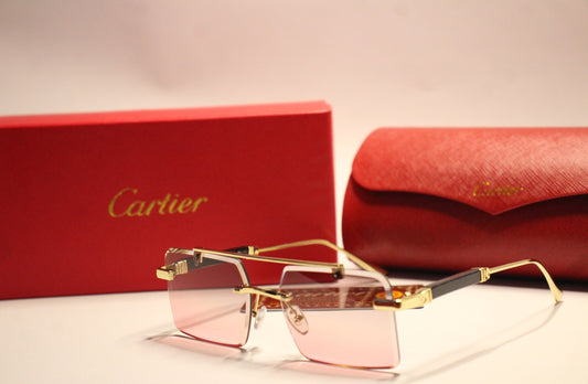 Three piece Cartier sunglasses – with golden Frame and pink Gradient Lenses.