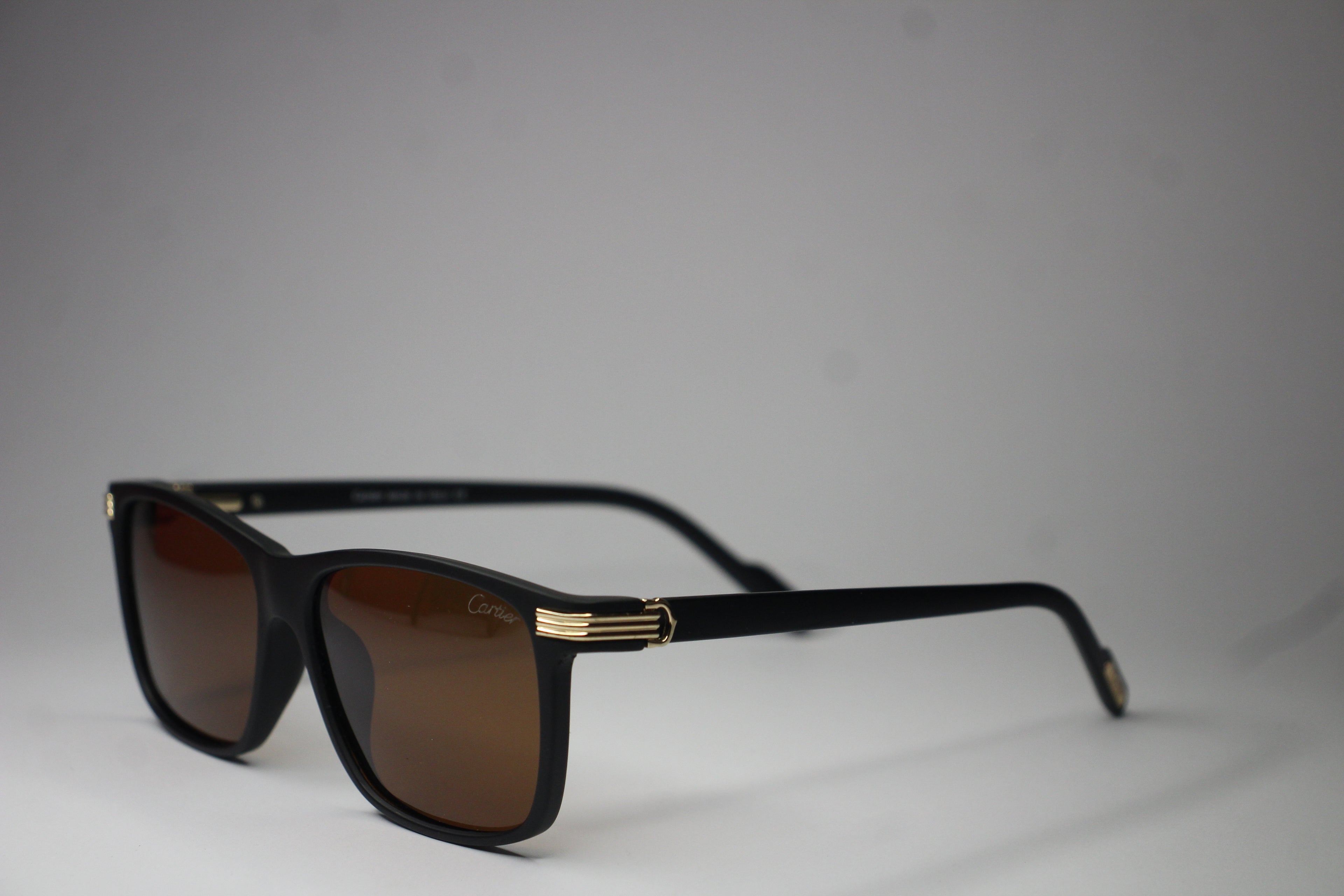 Cartier Black Edition – Matte Frame Sunglasses with Gold Detailing
